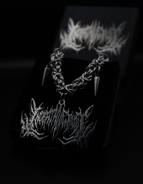 ad4123172f6a1da6a270f081bbf4cb751902022c.jpg Collier Choker InDeathWeTrust Logo